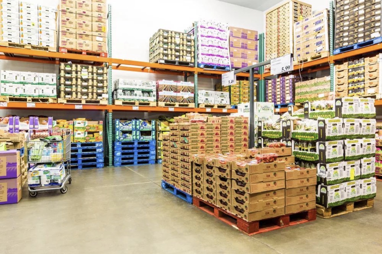 La Queen Produce wholesale distribution warehouse with pallets of fresh tropical produce in Miami